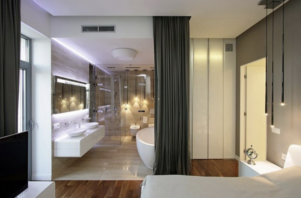 Thiết kế phòng ngủ ngăn cách nhà vệ sinh bởi lớp kính và rèm che phủ